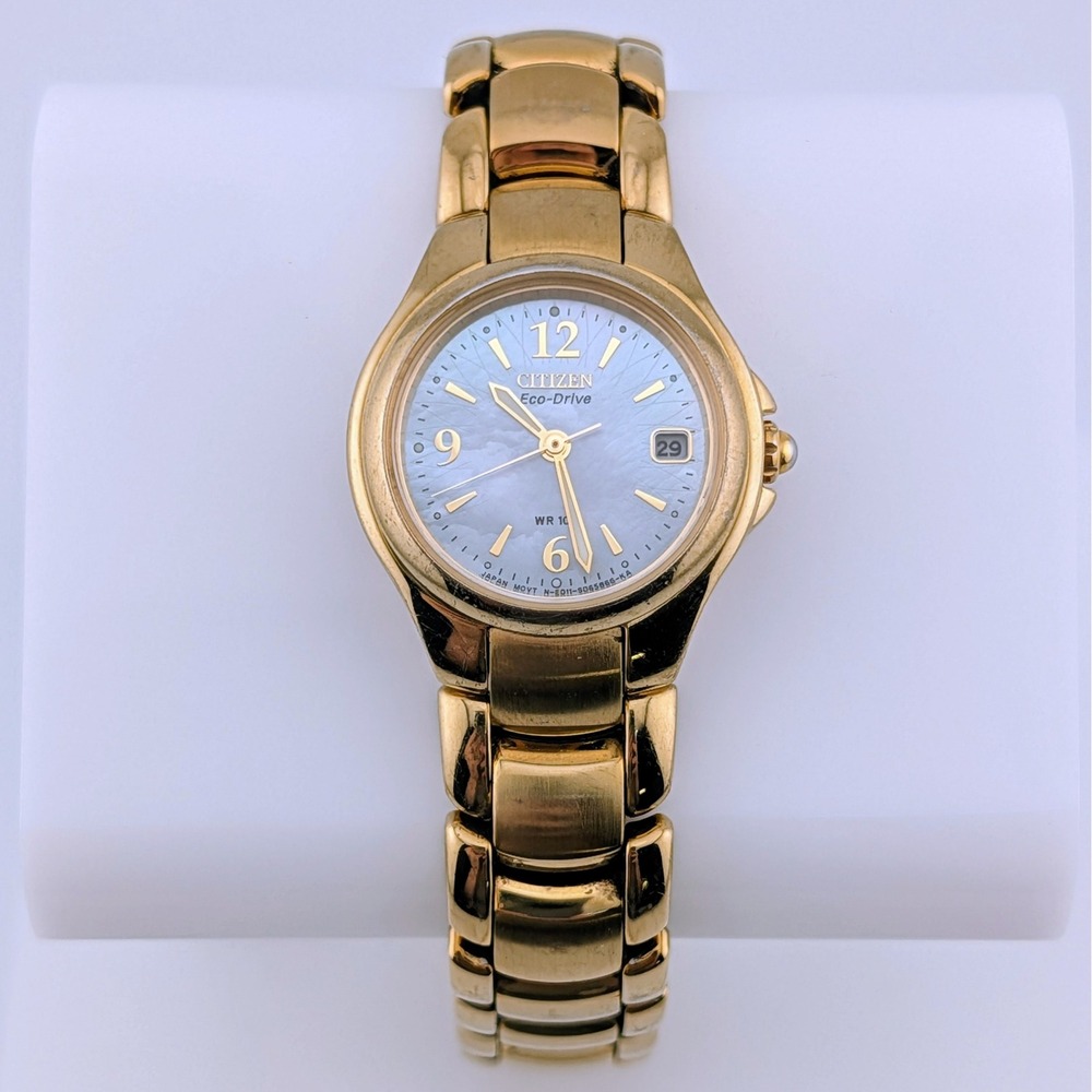 Citizen Eco-Drive E011-S039959 Women's Gold Tone Mother of Pearl Dial Date Watch